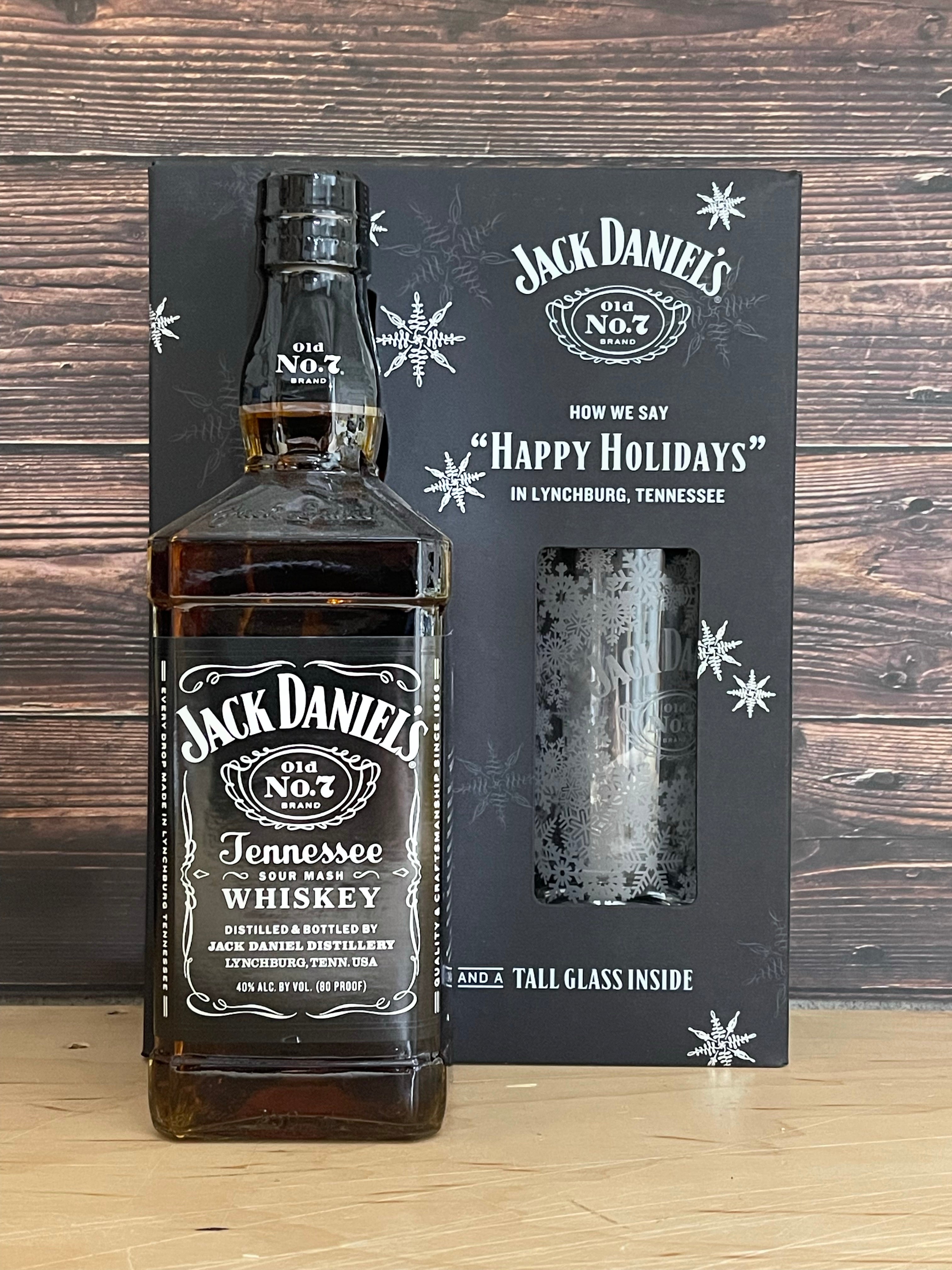 Jack Daniel's whiskey bottle and glass. Jack Daniel's is a brand